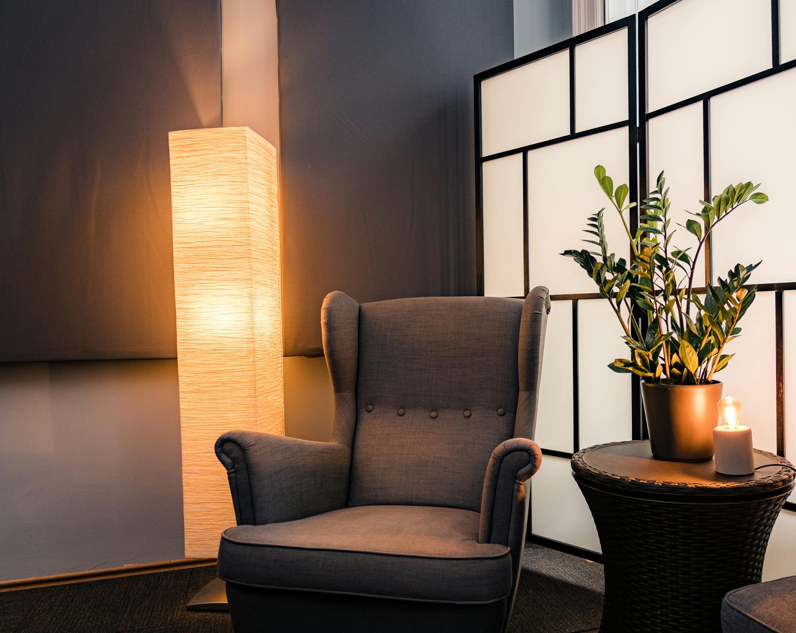 pexels photo 11906837 11906837 Inviting armchair with glowing floor lamp in a stylish interior setting in Budapest.